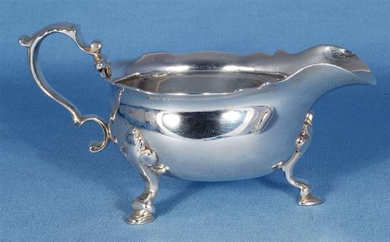 A pair of George II silver sauce boats, attributed to Joseph Sanders, length 195mm, weight 24.4 oz/760grms.